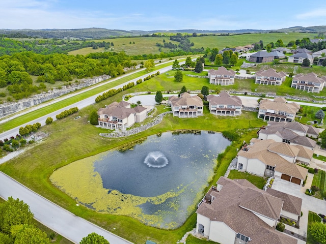 aerial view featuring a water view and a residential view