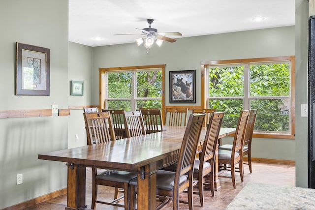 dining area with recessed lighting, wood finished floors, a ceiling fan, and baseboards