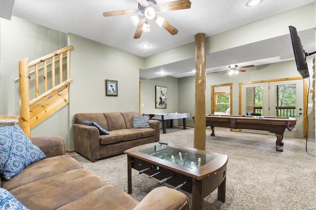 carpeted living area with billiards and a ceiling fan