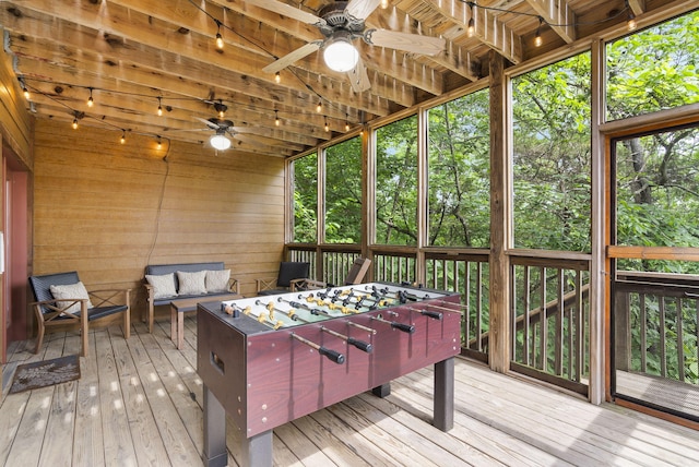 wooden terrace featuring ceiling fan and outdoor dining area