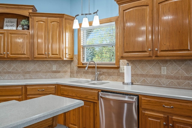 kitchen with decorative backsplash, light countertops, a sink, and dishwasher