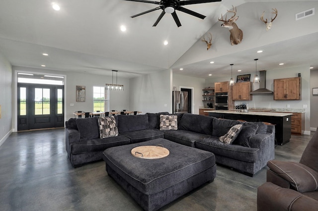 living room featuring recessed lighting, visible vents, finished concrete floors, high vaulted ceiling, and baseboards