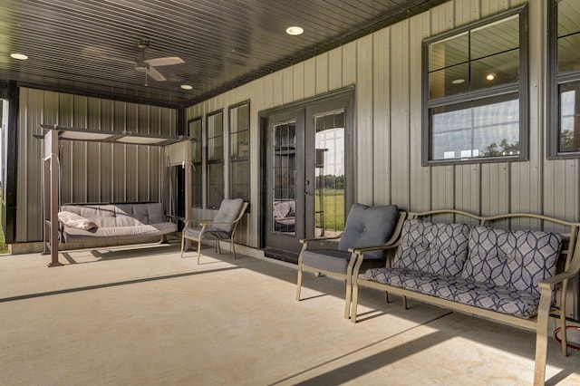 view of patio / terrace with a ceiling fan and french doors