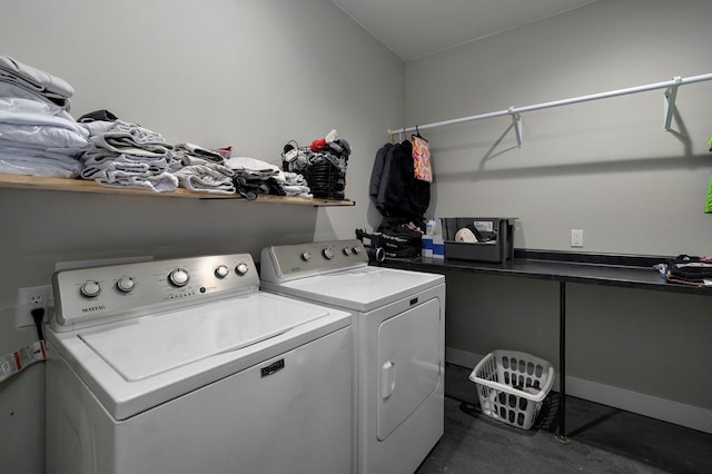 washroom featuring laundry area and separate washer and dryer