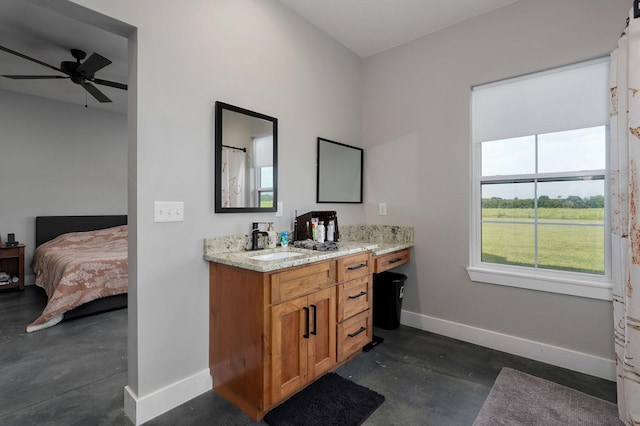 full bathroom with finished concrete floors, ceiling fan, vanity, and baseboards