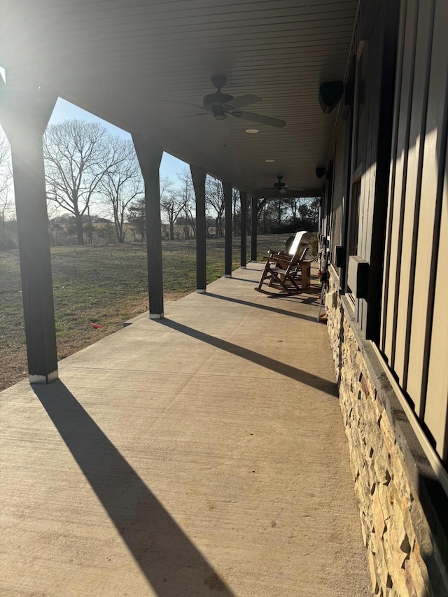 view of patio featuring ceiling fan