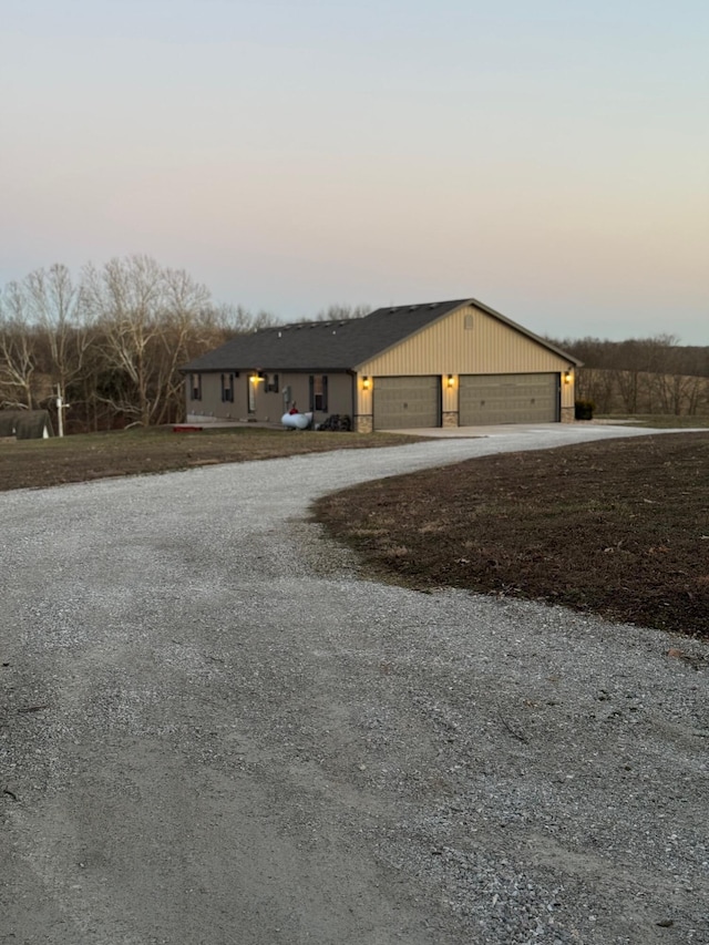 ranch-style house with driveway