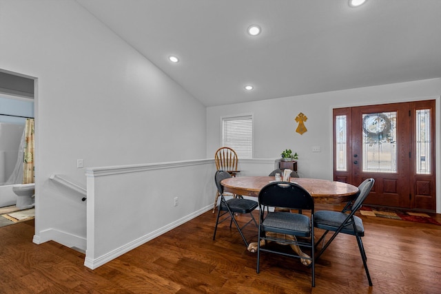 15221 Cleveland Rd, Houston, MO 65483 - dining area with baseboards, vaulted ceiling, wood finished floors, and recessed lighting