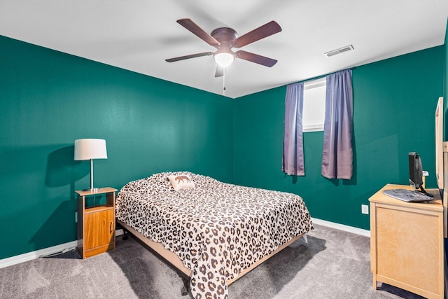 15221 Cleveland Rd, Houston, MO 65483 - carpeted bedroom featuring baseboards, visible vents, and a ceiling fan
