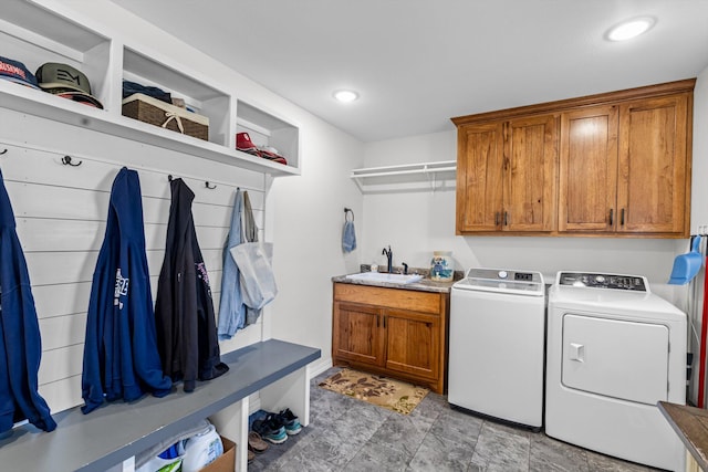 15221 Cleveland Rd, Houston, MO 65483 - laundry area with washer and clothes dryer, a sink, cabinet space, and recessed lighting