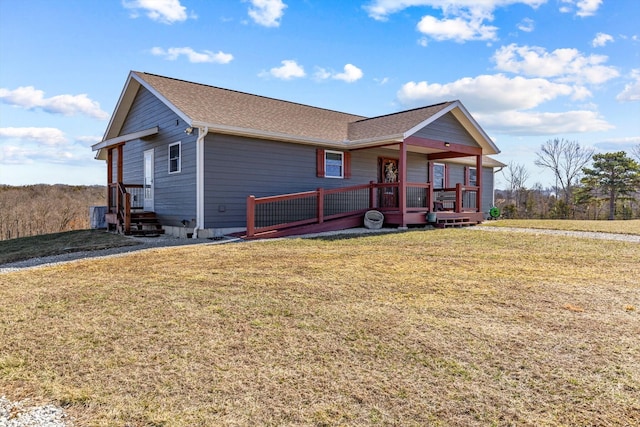 15221 Cleveland Rd, Houston, MO 65483 - ranch-style house with roof with shingles, a porch, and a front yard