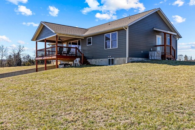 15221 Cleveland Rd, Houston, MO 65483 - rear view of property featuring a ceiling fan, roof with shingles, and a yard