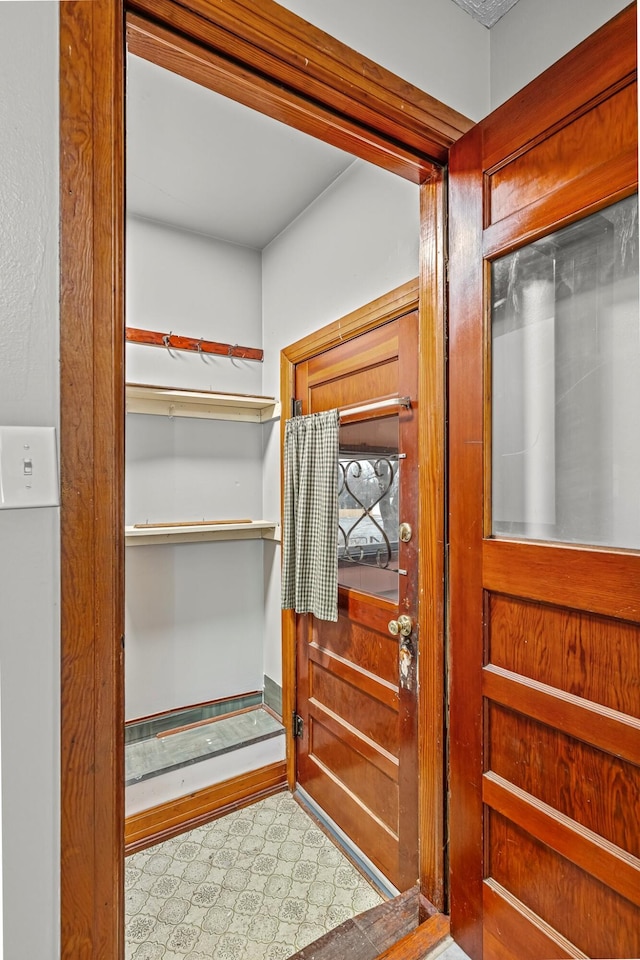 spacious closet featuring tile patterned floors