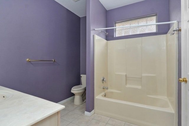 bathroom featuring shower / bathtub combination, tile patterned flooring, toilet, vanity, and baseboards