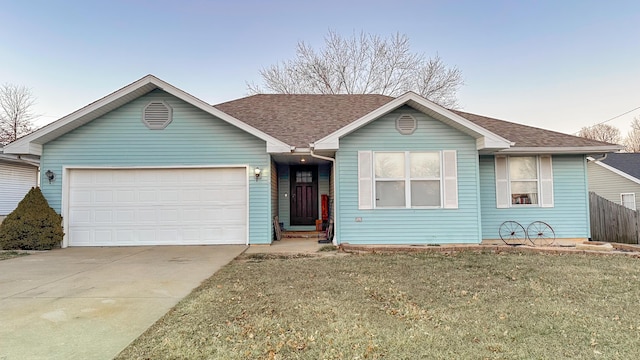 ranch-style home with driveway, a shingled roof, an attached garage, and fence