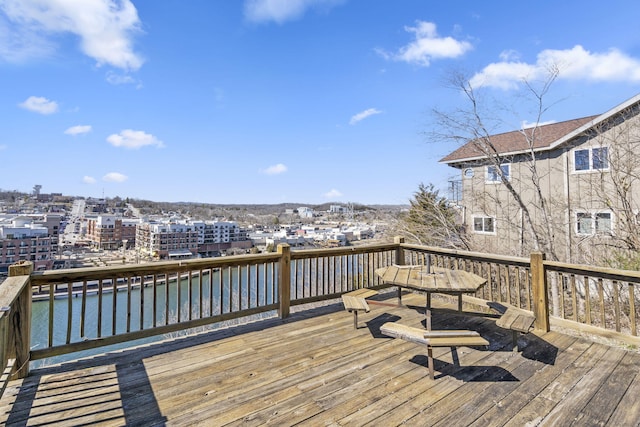 wooden deck with a water view