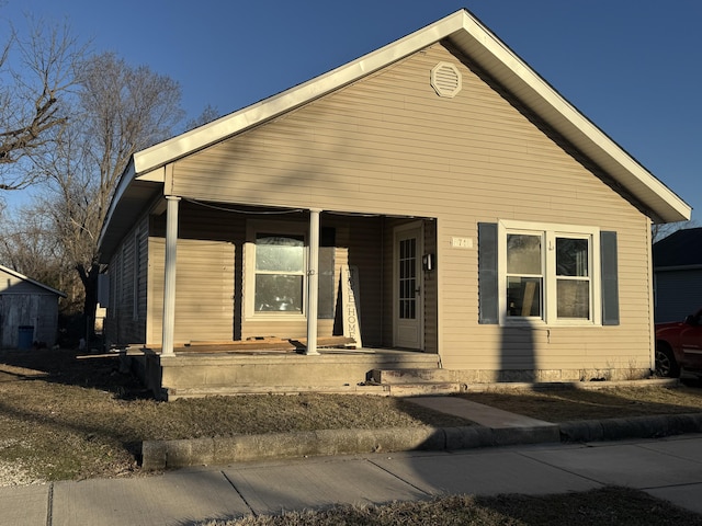 bungalow-style home with a porch