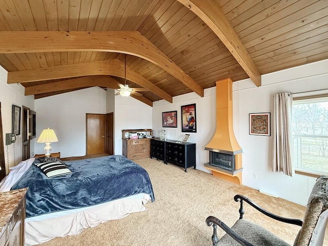 bedroom with lofted ceiling with beams, carpet flooring, and wood ceiling