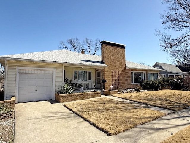 single story home featuring brick siding, roof with shingles, a chimney, concrete driveway, and an attached garage