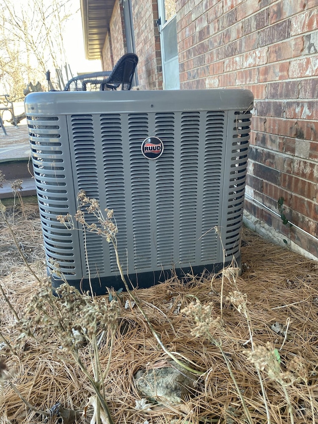 details with brick siding and cooling unit