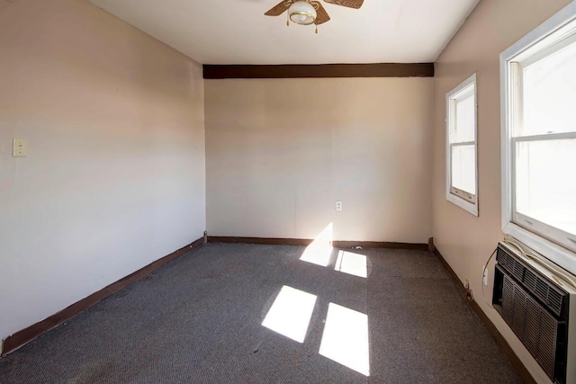 unfurnished room featuring baseboards and a ceiling fan