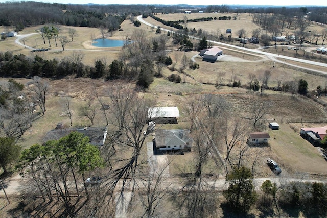 aerial view featuring a rural view and a water view