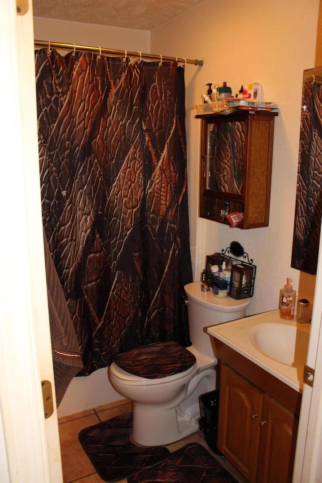810 W College St, Springfield, MO 65806 - full bathroom featuring vanity, toilet, and tile patterned floors