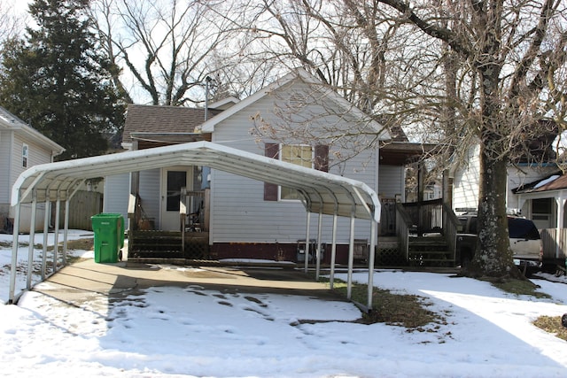 view of front of home featuring a carport