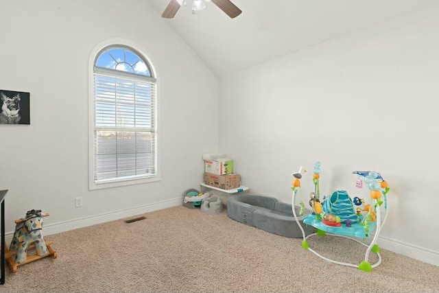 playroom featuring lofted ceiling, carpet, visible vents, and baseboards