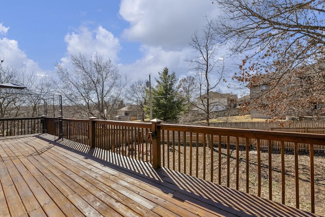 wooden deck featuring fence