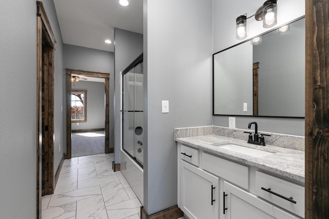 full bathroom with marble finish floor, bath / shower combo with glass door, vanity, and recessed lighting