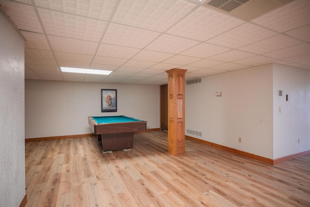 game room with light wood-style floors, a paneled ceiling, visible vents, and baseboards