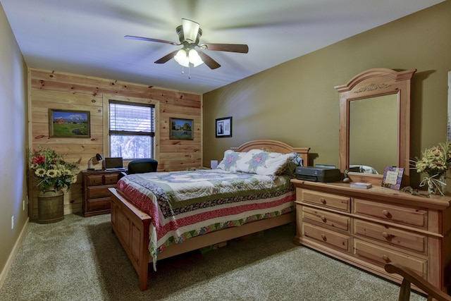 bedroom featuring baseboards, a ceiling fan, and light colored carpet