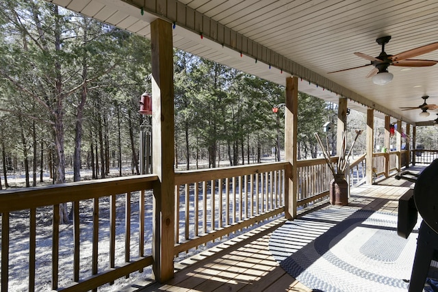 snow covered deck with ceiling fan