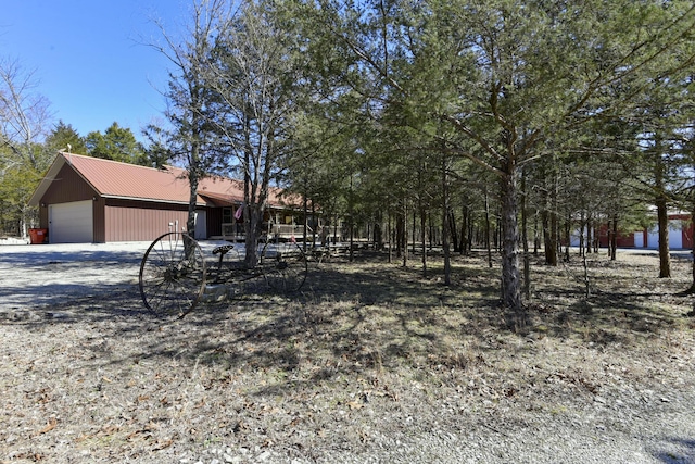 view of yard with a garage