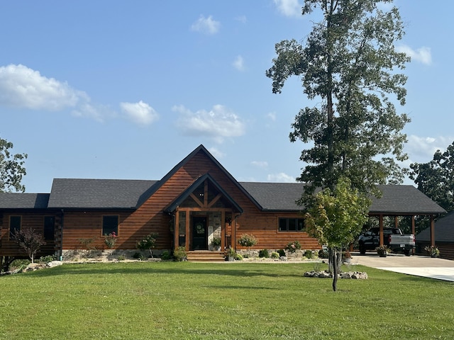 log-style house with a carport, a front lawn, and driveway