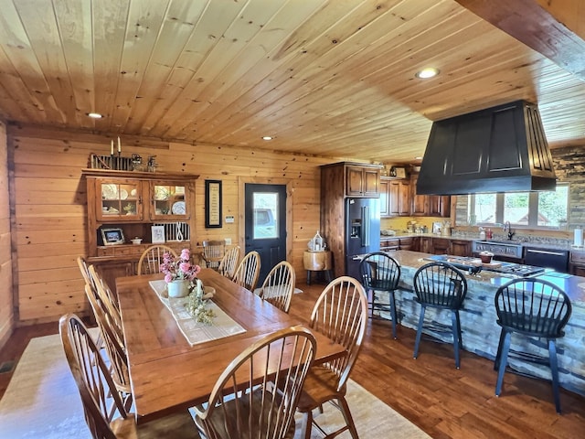 dining room featuring wood ceiling, recessed lighting, a wealth of natural light, and light wood-style floors