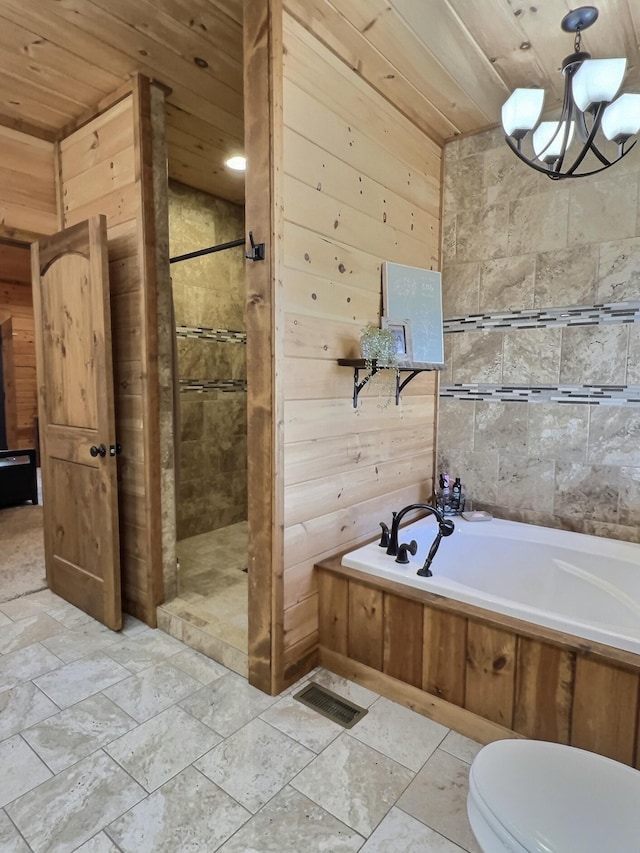 full bathroom featuring wood walls, wooden ceiling, a garden tub, and a shower stall