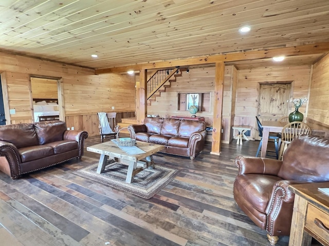 living room featuring wooden walls, hardwood / wood-style flooring, wood ceiling, stairway, and recessed lighting