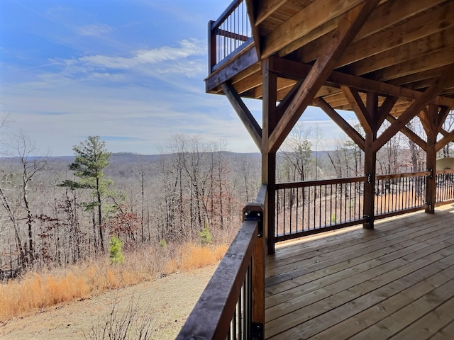 deck featuring a forest view