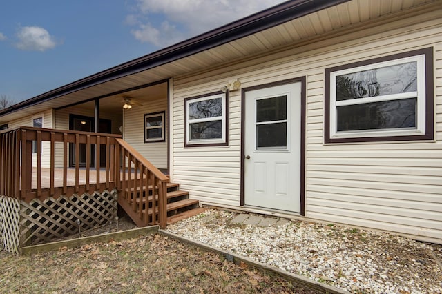 entrance to property with a deck