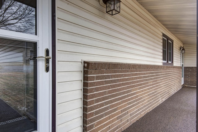 view of home's exterior featuring brick siding