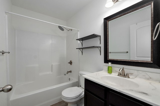 full bath featuring shower / bathtub combination, vanity, and toilet