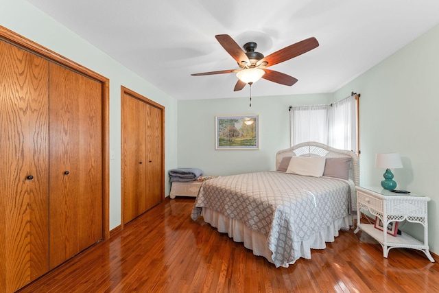 230 Temple Ln, Shell Knob, MO 65747 - bedroom featuring ceiling fan, two closets, and hardwood / wood-style flooring