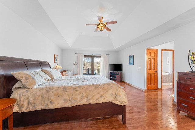 230 Temple Ln, Shell Knob, MO 65747 - bedroom featuring baseboards, a raised ceiling, wood-type flooring, access to exterior, and recessed lighting