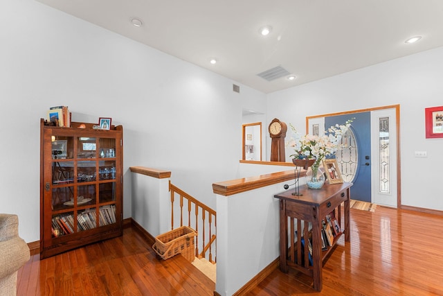230 Temple Ln, Shell Knob, MO 65747 - hall with hardwood / wood-style flooring, recessed lighting, visible vents, and an upstairs landing