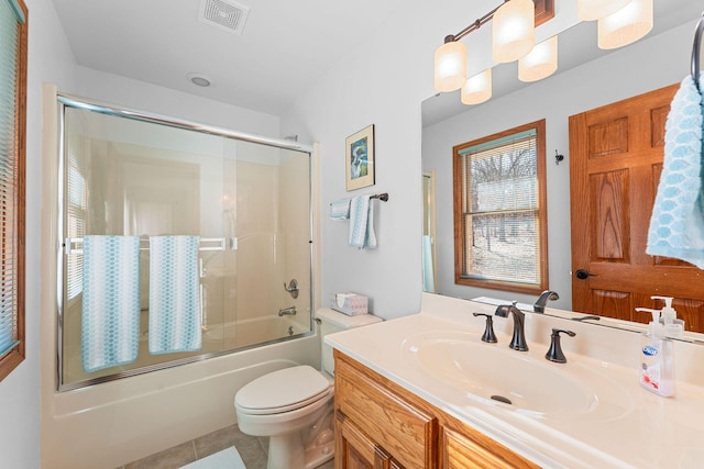 230 Temple Ln, Shell Knob, MO 65747 - bathroom featuring bath / shower combo with glass door, visible vents, toilet, vanity, and tile patterned floors