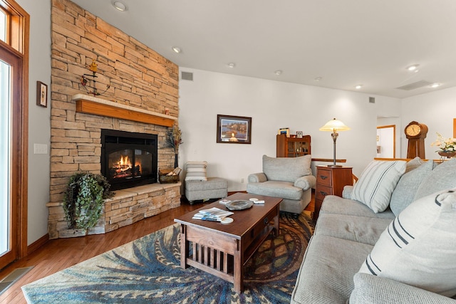 230 Temple Ln, Shell Knob, MO 65747 - living area with visible vents, wood finished floors, and a stone fireplace