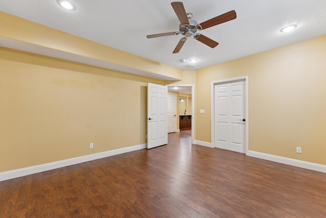 empty room featuring recessed lighting, ceiling fan, baseboards, and wood finished floors