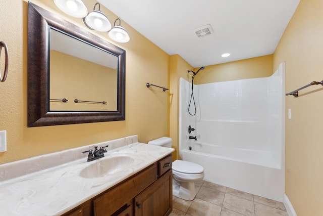 full bathroom featuring toilet, vanity, visible vents, shower / washtub combination, and tile patterned floors